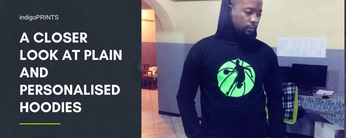 Anesu Michael Maposa wearing a personalised basketball hoodie inside an office