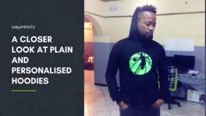 Anesu Michael Maposa wearing a personalised basketball hoodie inside an office