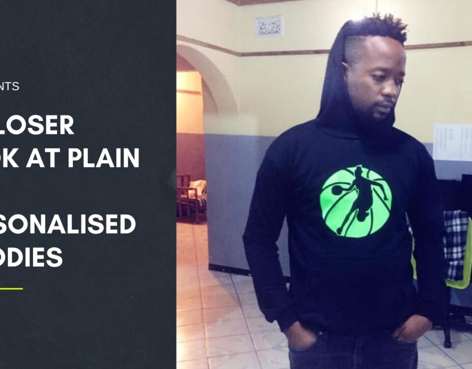 Anesu Michael Maposa wearing a personalised basketball hoodie inside an office